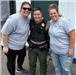 Nicholas and his mom with the Sheriff and Police at a table