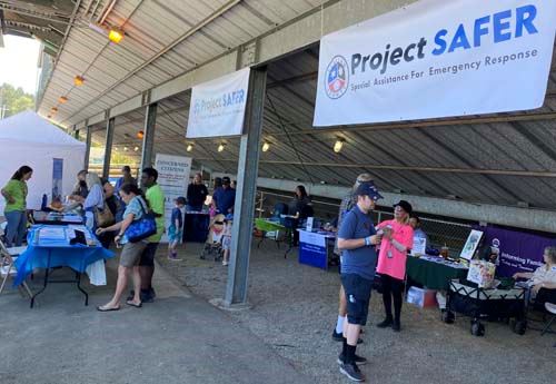 Fair Goers check out Project SAFER