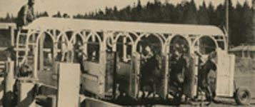 Horses busting out of the starting gate during the 1972 Fair