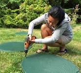 Woman Drilling Riser Lid